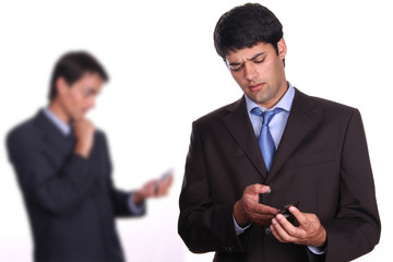 business man working on pda or smartphone