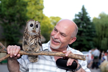 Friends, man and wise owl
