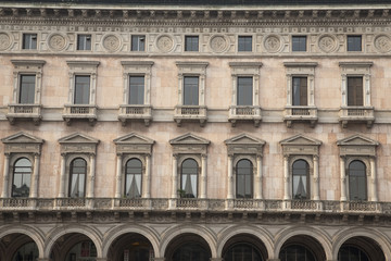 Fototapeta premium Facade on Duomo Square in Milan, Italy