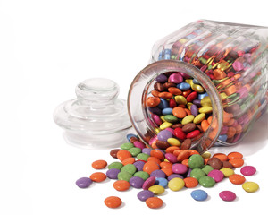 sweet jar with sweets spilling out