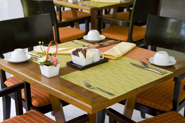 Table and chairs in empty cafe