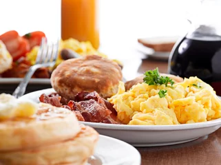 Wall murals Product Range huge breakfast with selective focus on center plate
