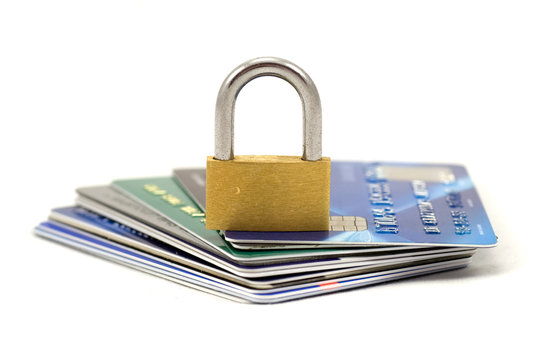 Credit cards and lock, business security background