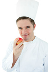 Cook holding an apple