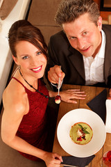 couple feeding each other - dessert - food