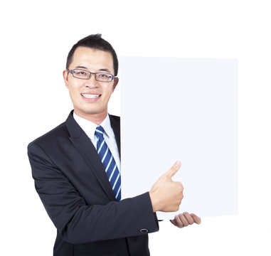 young businessman holding empty board and thumb up