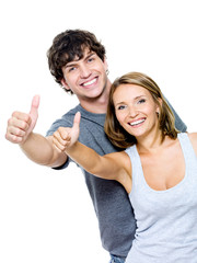 smiling people with thumbs-up gesture