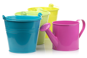 Colorful buckets and watering can