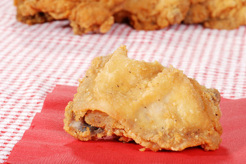 fried chicken on red napkin