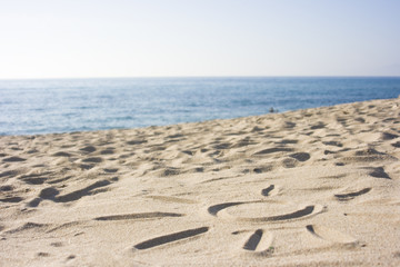 Sonne - Symbol im Sand