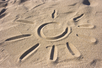 Sonne - Symbol im Sand