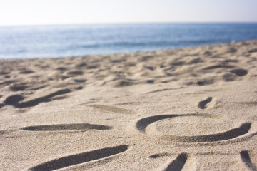 Sun Symbol in Sand