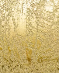 Foto op Plexiglas Metaal hobbelige gouden plaat met veel diepe textuur