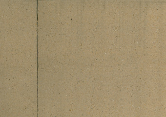 piece of cardboard with a deep crack