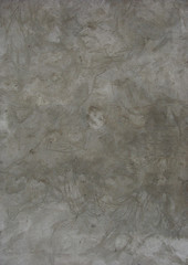 large cloudy gray concrete wall with wash stroke pattern