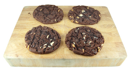 four cookies on cooling board isolated on white