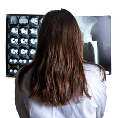 A Young Doctoress Analyzing X-Ray Image