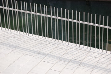 White fence at river bank