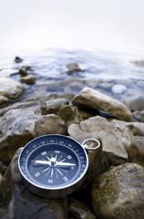 compass on the shore