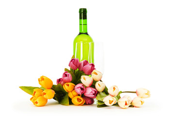 Obraz na płótnie Canvas Wine and flowers isolated on the white background