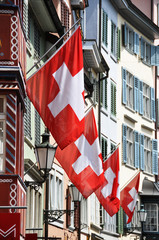 Zurich decorated with flags for the Swiss National Day