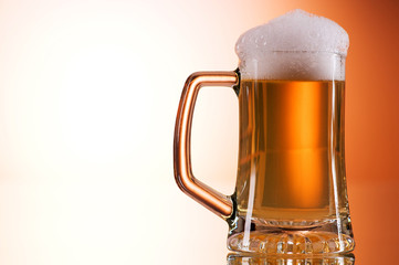 Beer glasses against the colorful gradient background