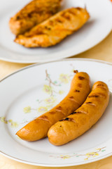 Bratwurst , gegrillt,mit Koteletts