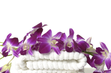 Fototapeta na wymiar Branch orchid on a white towel