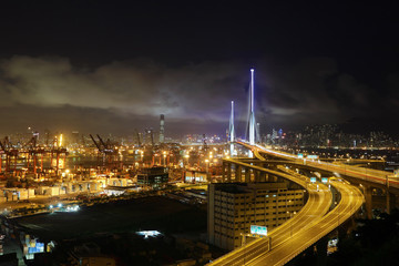 Fototapeta na wymiar container terminal and bridge in Hong Kong at night