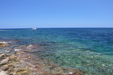 sea coast landscape with motorboat