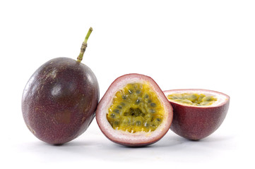 passion fruit , cut open on white