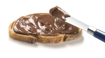 spreading chocolate cream with a knife