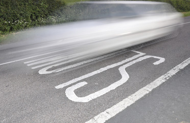 white speeding car