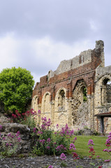 Obraz premium flowers in front of old ruins from Kent UK