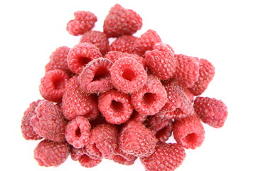 Raspberries: a stack of fruit on white background