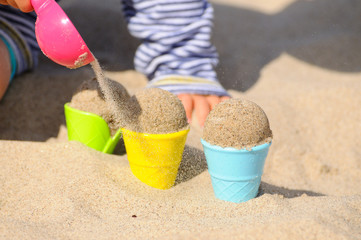 Förmchen am Strand