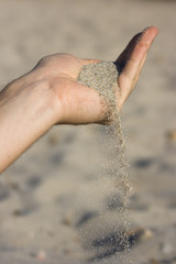 Hand mit Sand