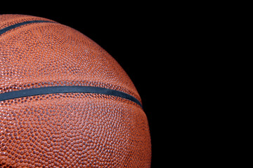 Basketball ball isolated on black