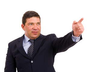 mature business man pointing with his finger, isolated on white