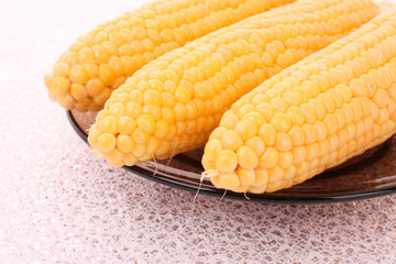 Tasty boiled  yellow corn on the table