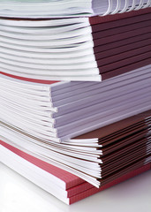 Many color magazines on white background