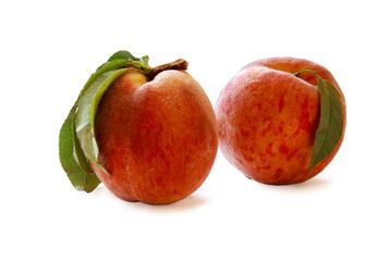 Два сочных персика.