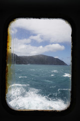 Ship window and rough sea