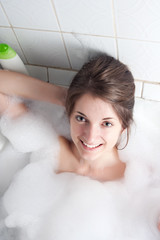 girl sitting in a bath
