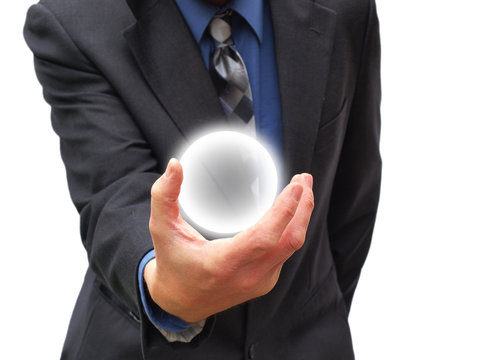 Glowing Sphere In Hands Of Businessman On White