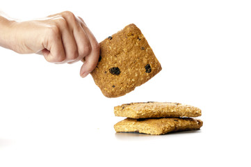 Oatmeal cookies in the woman hands