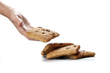 Oatmeal cookies in the woman hands