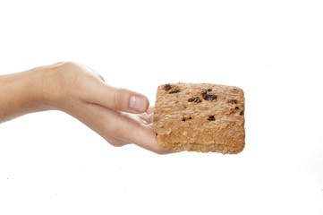 Oatmeal cookies in the woman hands