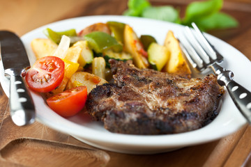 Grilled pork with roasted vegetables
