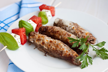 Roasted stuffed pork rolls